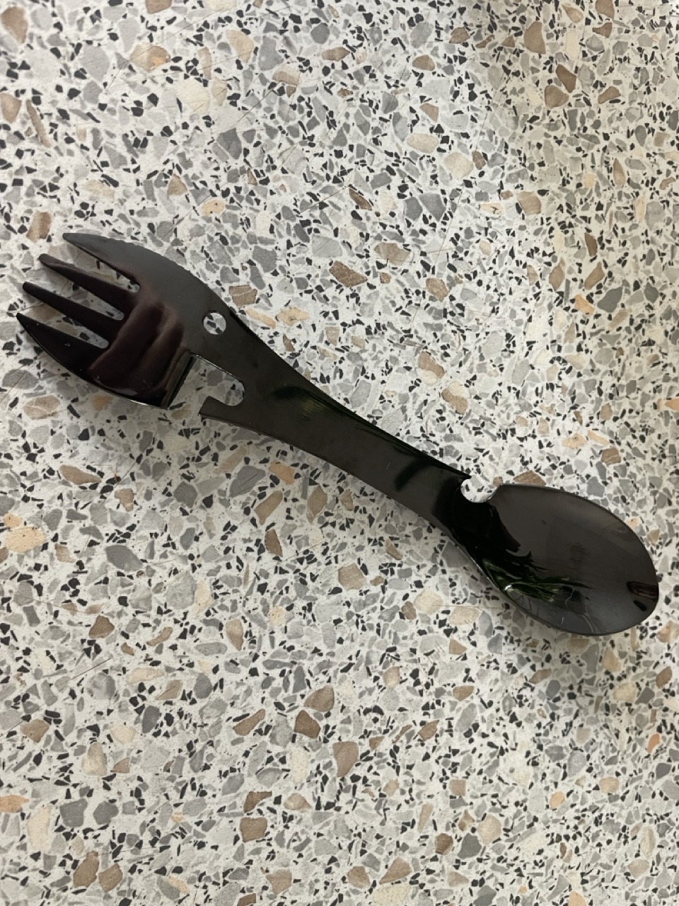 Black spork with bottle opener